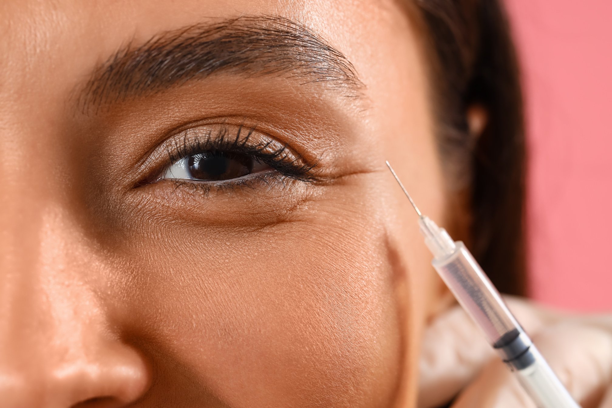 Young Woman Receiving Filler Injection in Face, Closeup